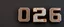 Placeholder: "2026" in squared block letters made of shiny and rusty metal on contrasting background