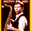 Placeholder: REd-haired Ron howard Is richie from happy days playing his saxophone with "closed-eyelids", rock band, embouchure, joanie cunningham