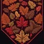 Placeholder: autumn colored cloth banner embroidered with leaves