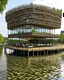 Placeholder: extreme restaurant with sustainable design, one level, located in a lake, it must make people feel intrigued to go into that restaurant