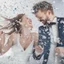 Placeholder: A couple with silver confetti