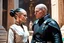 Placeholder: a bold and heroic bald male Corellian pilot in black and grey First Order special forces gear meets a female Jedi Master in ancient, mystical temple, hyperdetailed, dynamic lighting, hyperdetailed background, 8k resolution, volumetric lighting, light skin, fully symmetric details