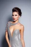 Placeholder: young, beautiful brunette with a perfect angry face, wearing silver lace off shoulder dress, standing in a modern stage with nice dancing lights.