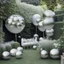 Placeholder: A picture of a modern garden with silver balloons and other party decoration