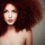 Placeholder: Woman with red curly hair and brown eyes