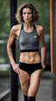 Placeholder: photography of a beautiful anorexic woman, anthracite satin triathlon top, sports illustrated, grey short wavy bob haircut, pronounced sternum, flat chest, anthracite short leggins