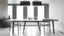 Placeholder: modern light room interior with a table in the center