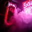 Placeholder: A exhaust pipe performing at dance club, his name is "exhaust pipe" and looks crazy, looks very aggressive look, Neon lights and smog, Im a "exhaust pipe" SIGN ON WALL