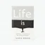 Placeholder: Un livre de poche intitulé Life is.