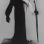 Placeholder: Russian Orthodox nosferatu with long arms and a robe made a human skin