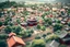 Placeholder: Diorama style birds-eye toy-like tilt shift image of 1700s Japanese city with temple and walls and lots of trees