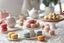 Placeholder: amigurumi desserts, cookies and macarons on lace tablecloth in a modern kitchen in sunshine