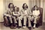 Placeholder: Awkward Family Photo, old and young sitting on chairs, weird smiling, long 1970 hair and mustasch