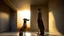 Placeholder: In the high-ceilinged room with polished cement walls, a short-haired woman and a long-legged greyhound shared the same silence, both motionless in front of an abstract sculpture that reflected the light of the sunset.