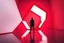 Placeholder: Ultra realistic studio fine art photography of a human figure interacting with large geometric light structures, red and white minimal lighting design, physically built set with reflective surfaces, dramatic shadows, contemporary art installation style, editorial composition, shot on Canon EOS R5, 24mm lens, f/4, ISO 200, RAW photo, HDR, true-to-life colors, ultra photorealistic, highly detailed, sharp focus, masterpiece, 8k, modern art photography
