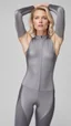 Placeholder: photography of a beautiful anorexic woman, grey satin triathlon top, sports illustrated, blond short wavy bob haircut, pronounced sternum, flat chest, anthracite cycling leggins