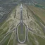 Placeholder: Vista aérea simétrica de un aeropuerto en forma de mariposa, espectacular, impactante, calidad ultra, maximalista, 8k 3D