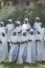 Placeholder: 7 suore africane con tunica grigia giornata di sole