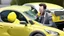 Placeholder: guy arguing on phone next to his lemon shaped kia sportage