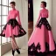 Placeholder: extravaganza wedding dress, short pink black shows legs, long sleeves show whole dress