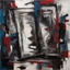 Placeholder: [art by Jean-Paul Riopelle] the reflection in the mirror in not her