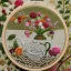 Placeholder: exquisite whimsical teashop in embroidery hoop, intricate, highly detailed, linen and wood backdrop