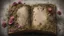 Placeholder: ancient spellbook, cover made from flowers, vines, tattered, loose pages