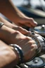 Placeholder: Create a dynamic scene of a regatta with multiple sailboats competing. Zoom in on a close-up of a sailor's wrist, highlighting the sailing watch as they skillfully navigate their boat through the course.