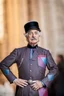 Placeholder: Einstein i n Azerbeyjan traditional costum color full ,upper body ,blury background ,closeup ,sharp focus