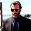 Placeholder: muscular Hans Gruber from the movie Die Hard, dark sunglasses