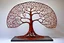 Placeholder: flat lace abstract sculpture representing an apple tree erected in a treeless meadow. the trunk and leaves are rusted unpainted iron the flat metal apples are enamelled red