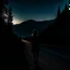 Placeholder: dark night, a woman silhouette on the side of the road,, mountains and forests next to the road, a sunrise in the distance, photo quality