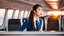 Placeholder: A gorgeous Asian model in an air hostess uniform looking out of the window at sunset