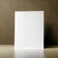 Placeholder: A photo of a white folded card, 5.5 by 4.25 inches. The card is laying vertically on a beautiful surface.