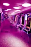 Placeholder: A dark photo an 80's aesthetics arcade at night, with a lot of functioning arcade machines, a vaporwave floor and some colorful tiles in between the floor. Dark Purple Themed, purple aesthetics.