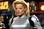 Placeholder: Jeri Ryan as Seven Of Nine (Star Trek), she is waiting in Quark's bar