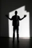 Placeholder: a man in an empty space standing in front of a wall looking at his shadow reflected on the wall. The shadow is raising his hands y