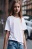 Placeholder: candid picture, (extremely detailed CG unity 8k wallpaper), full shot of a street scene of a beautiful and very tall young 12 year old girl wearing a white t-shirt, jeans, with long blond hair, plateform shoes, Caucasian, Intricate, busy, High Detail, Sharp focus, dramatic, photorealistic, malachite eyes, three point lighting, dslr, f3.5