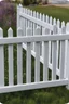 Placeholder: white vinyl fence in yard, photograph