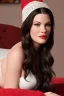 Placeholder: Liv Tyler is wearing a red hat, a flowery hat, and she's sitting in her own bed, in her own room.