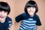 Placeholder: Photo of a dumb boy with a Huge grin and Bowl cut black hair