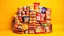 Placeholder: An image with the theme of orange, yellow, and bright red colors, filled with all kinds of drink cans, cakes, cookies, pasta packages, chips, puffs, sausages, and sausages stacked together in the middle of the image.