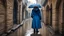 Placeholder: A cobbled alleyway, framed by stone arches, was almost empty save for a cat that slowly crossed, indifferent to the rain. In one corner, a woman in a blue coat waited under a black umbrella, her boots sinking slightly in the accumulated water.