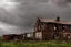 Placeholder: Old farmhouse, wasteland, storm, ruins, rain