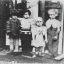 Placeholder: Old creepy photo of unusual children with lego