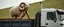 Placeholder: sheep warrior operating a trebuchet on a lorry