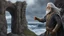 Placeholder: The stately and wise sorcerer named Pealda Stormbringer is walking on a rocky beach looking at a stormy ocean. He is dressed as a lord. He has grey hair and a white beard. beautiful light brown leather gloves. no jewelry. everything is intricately sculpted, exquisite realism, fantasy art, identical eyes, perfect face, Hyperrealistic, splash art, concept art, mid shot, intricately detailed, color depth, dramatic, 2/3 face angle, side light, colorful background