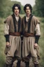 Placeholder: young and handsome identical twin brothers, black hair, dressed in epic peasant clothing