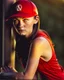 Placeholder: woman with a red baseball hat. leaning on a wooden balcony. night time. fantasy. studio lightining.