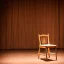 Placeholder: one and only single chair on stage in the beam of spotlight